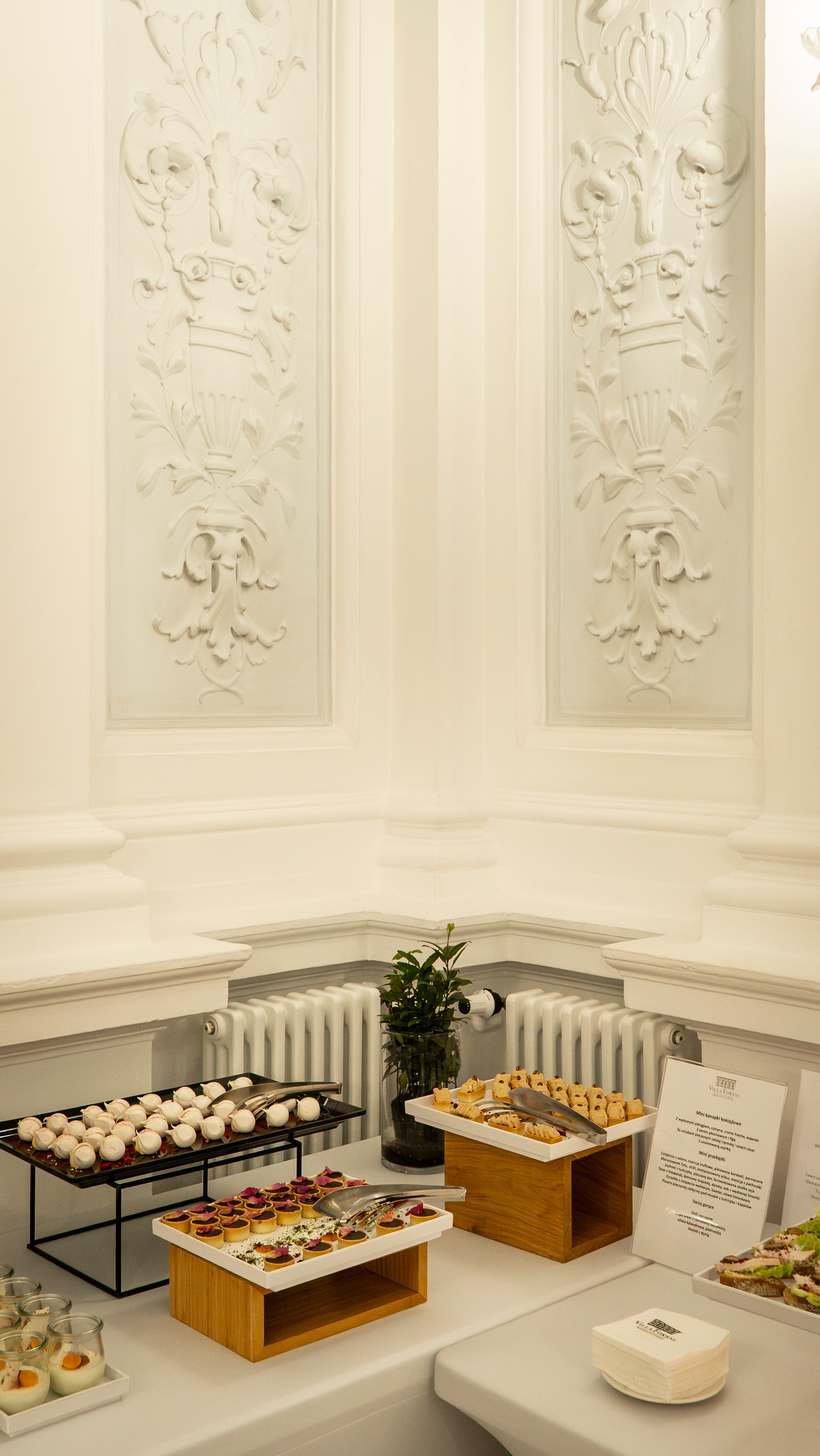Black and white photo of a women performing modern dance on a dark background.